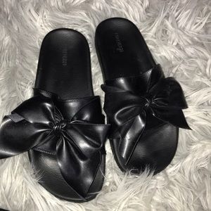 Black leather slides